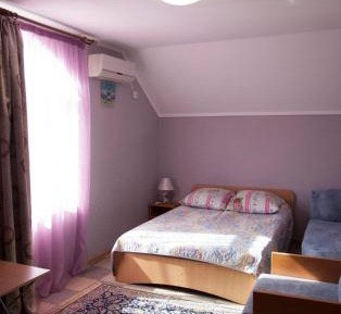 Quadruple Room with Private Bathroom