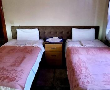 Quadruple Room with Shared Bathroom