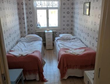 Small Twin Room with Shared Bathroom