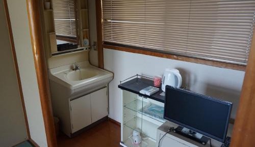 Family Room with Shared Bathroom  and Toilet 