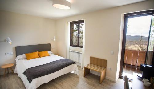 Habitación superior con balcón