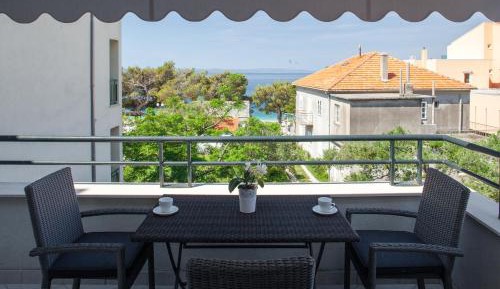 One-Bedroom Apartment with Balcony and Sea View