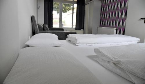 Quadruple Room with Private Bathroom