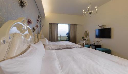 Standard Quadruple Room with Balcony and Sea View