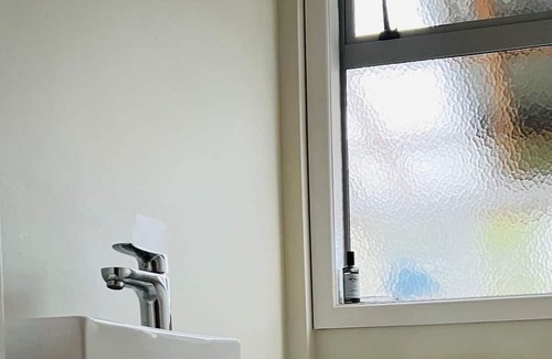 Waitao House | Spacious bungalow set in an avocado orchard.