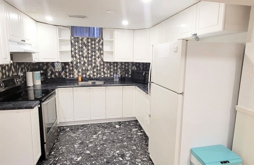 Lisgar House | Private 2-bed basement apartment with kitchen & bath. Shared laundry.