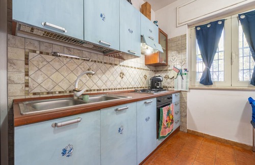 Giba House | Holiday Home 'La Casa Di Coccola' with Private Terrace, Wi-Fi and Air Conditioning