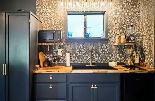 Lost Bridge Village House | Charming Retreat with Luxurious Amenities and Unique Cave Features