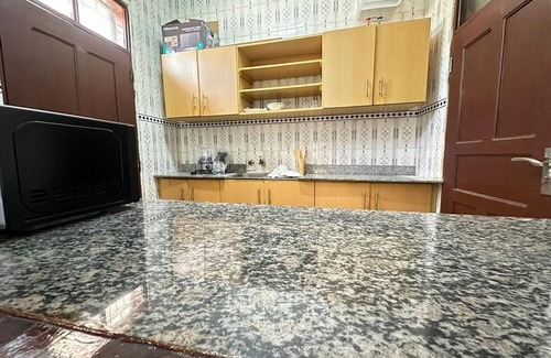 Dar es Salaam House | Unmatched Convenience: The Brownstone Provides Easy Access to Evrything You Need