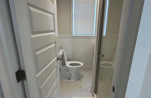 Patchogue Cottage | A charming yellow cottage , where you can place your feet in the sand and relax!