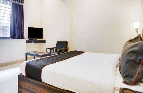 Shivajinagar Hotel | Capital O Hotel Span Executive