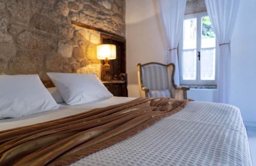 Lindos Cabin | Boho style luxury lodge with private courtyard in the heart of Lindos.