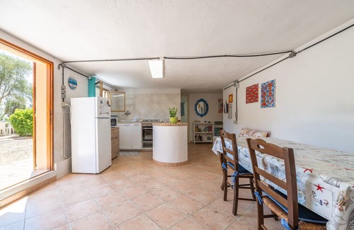 Sant'Antioco House | Holiday Home 'Fronte Mare Azzurro' with Sea View, Shared Garden and Wi-Fi