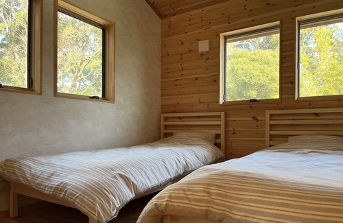 Kashima Villa | A log house tucked away in the forest of Kashima Jingu Shrine