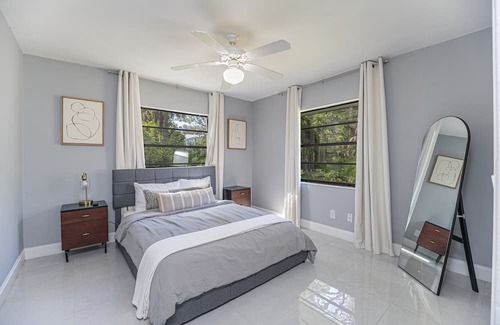 Palm River Estates House | Gorgeous Naples home with open-concept layout, sunroom, enclosed pool, & AC