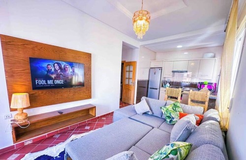 Oued Laou Apartment | Spacious terrace, pool and access to the sea.