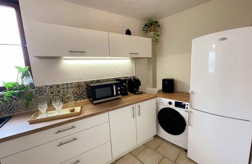 Nueil-sous-Faye Cottage | Charming 19th-Century Stone Cottage with Garden in Poitou