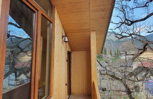 Borjomi Villa | Eco cottage with retro architecture and natural wood interior in Borjomi
