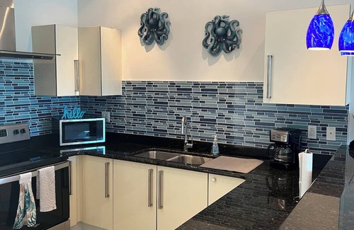 Bell Channel Bay Condo | Waterfront Charming Condo in Lucayan Gardens