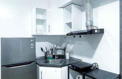 Iloilo Condo | Warm Urban Studio with modern design