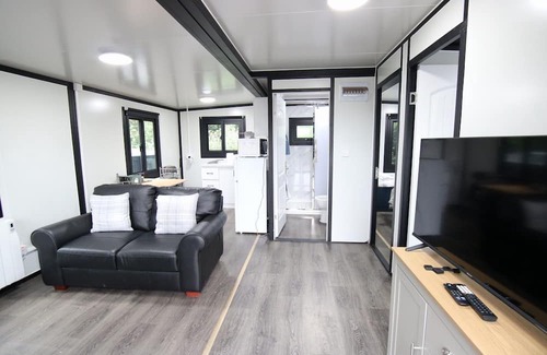 Portglenone Cabin | 2-BR Sunset Retreat Cabin HotTub& Sunset Views separate log cabin with projector