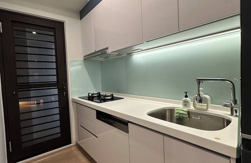 Tamsui Apartment | Spacious 3-bedroom apartment with WiFi, fitness room in New Taipei City