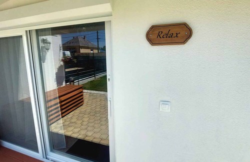 Buk Apartment | Holiday apartment on the ground floor, well-equipped kitchen and a view of the garden