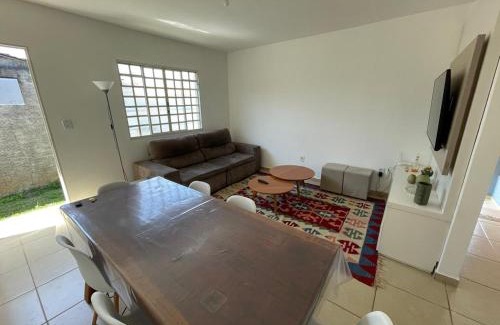 Santa Rita do Sapucai House | Casa espaçosa com duas garagens e quintal