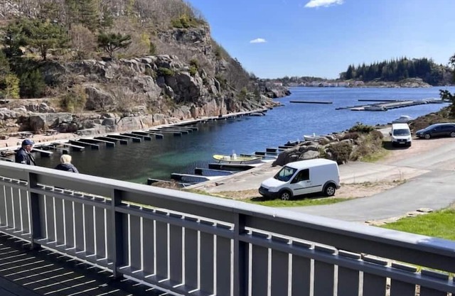 Holiday home Mona in Lussevika, new addition 2024, near Spangereid-Lindesnes, southern Norway, , max. 6 adults, own boat mooring, approx. 100 m² living space, 3 bedrooms, charming and tasteful furnishings, large veranda with fjord view, terrace f.