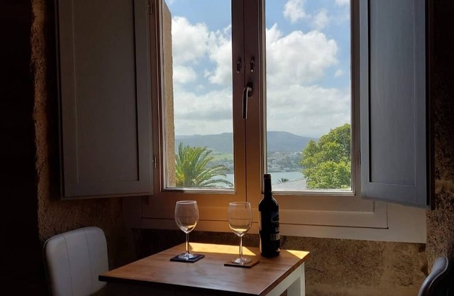 Bright duplex, with beautiful views of the river.