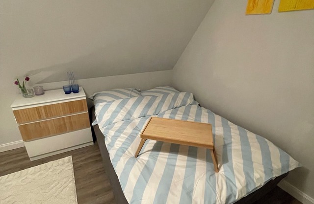 Cozy room in a beautiful home with easy access to anywhere in the city.