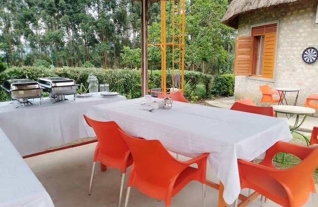 White Cat Farm Hut Inn is nestled on the outskirts of a quaint African village