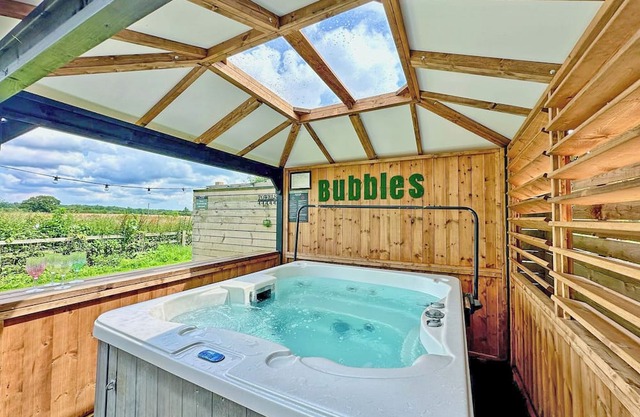 Recently upgraded with Gazebo over hot tub and side bar with stools.