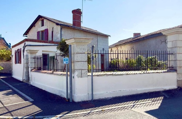 Charming 19th-Century Stone Cottage with Garden in Poitou