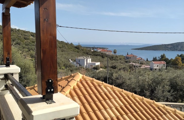 Silent, sea view, breezy house in a seaside village with garden.Family friendly