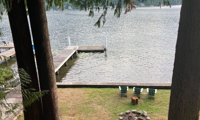 Lake Cavanaugh Cabin | Charming Waterfront Mid Century Waterfront Cabin w/ Hot Tub + Breathtaking Views