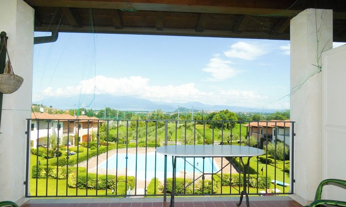 Polpenazze del Garda Apartment | Three-room flat in residence with garage, swimming pool and lake view