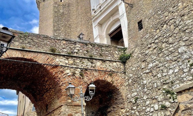 Civitella San Paolo House | Rome Castle House with Meals & Wine, within the interior of a medieval castle.