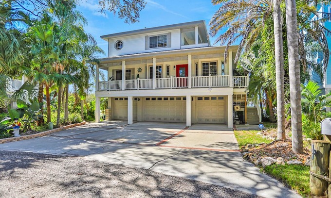 Palm Harbor House | Luxurious waterfront home w/pool, hot tub, game room, dock & water activities