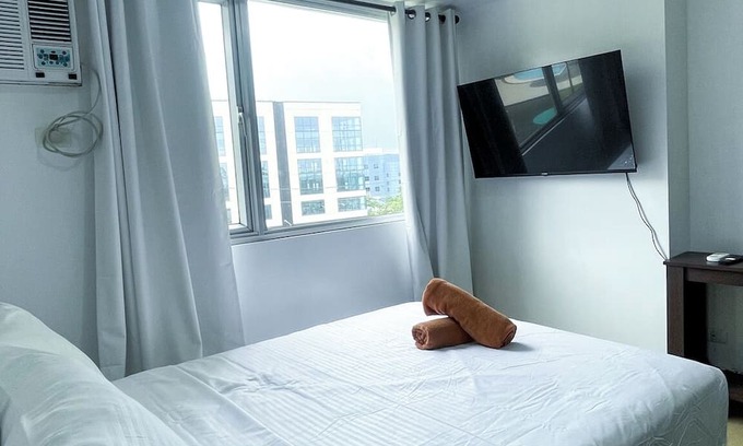 Iloilo Condo | Warm Urban Studio with modern design