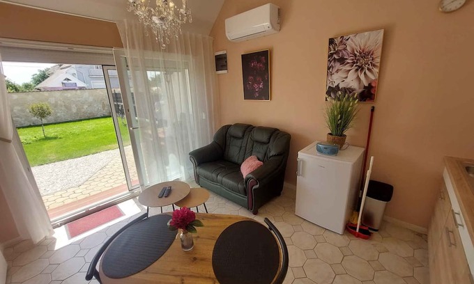 Buk Apartment | Holiday apartment on the ground floor, well-equipped kitchen and a view of the garden